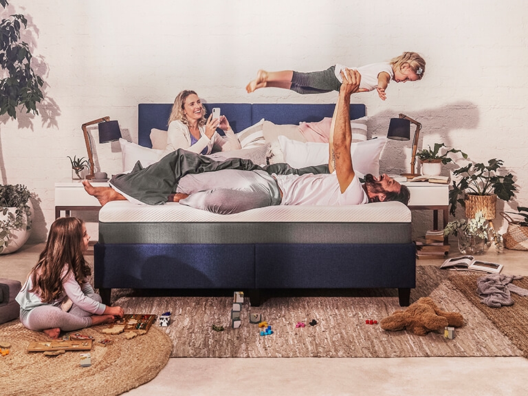 Family sleeping on Emma Mattress Family sleeping on Emma Mattress